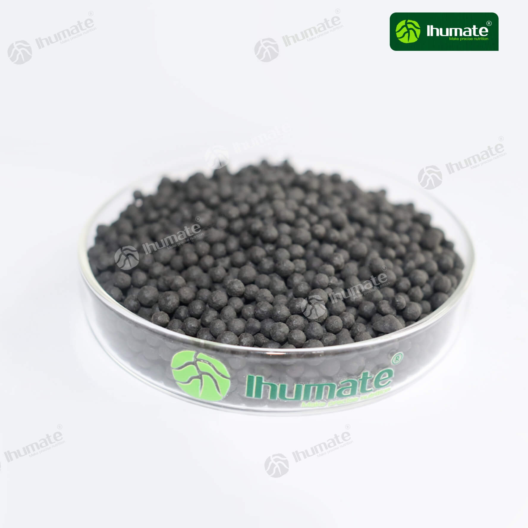 Ihumate humic amino acid shiny black balls front view, rich in organic matter and natural amino acids, effectively improves soil