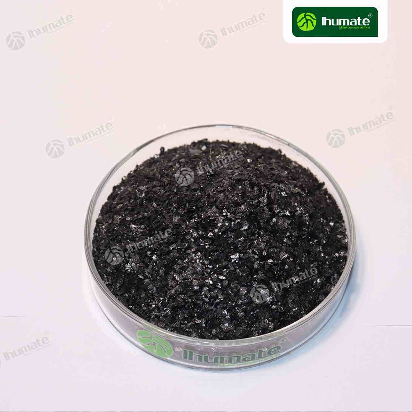 Front view of Ihumate HUWIN 100 potassium humate flakes, 100% instant soluble mineral source activity, improves fertilizer utilization
